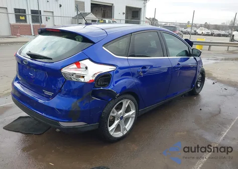 2015 Ford Focus Titanium z USA, uszkodzony, nr VIN 1FADP3N28FL268901